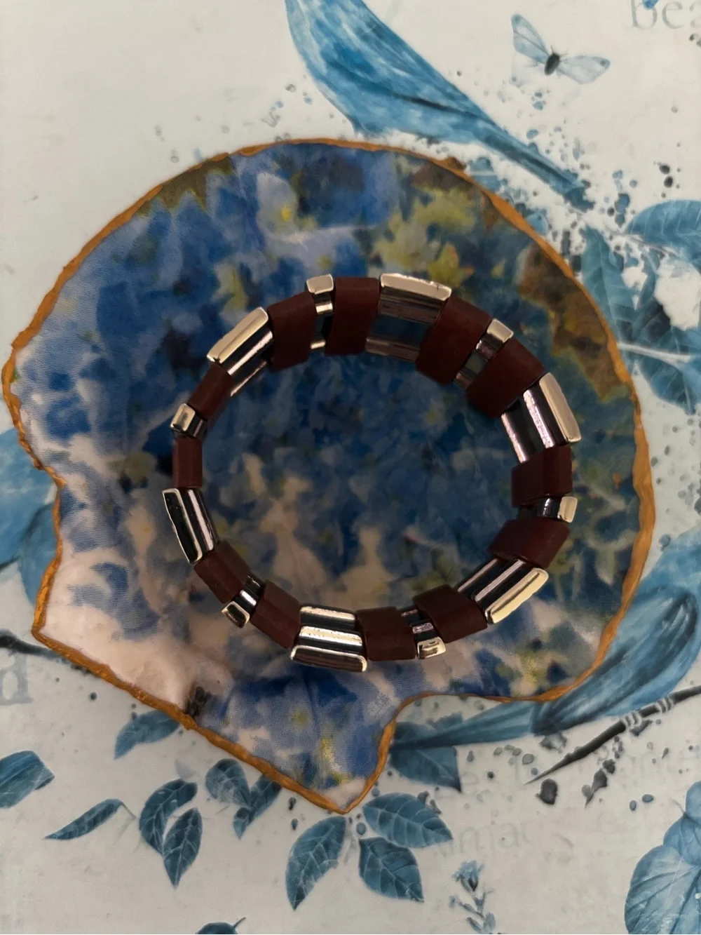 vintage multi-strand leather expansion bracelet accented with alternating silver